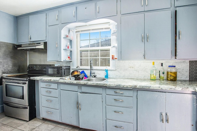 kitchen featuring a sink, decorative backsplash, stainless steel range with electric cooktop, black microwave, and under cabinet range hood