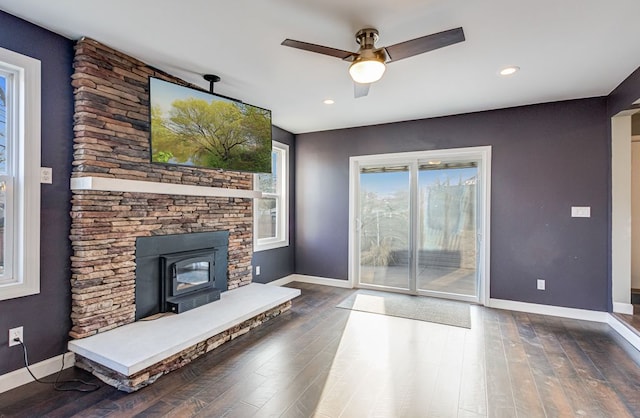 unfurnished living room with ceiling fan, baseboards, wood finished floors, and recessed lighting