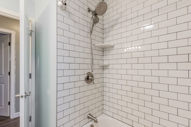 bathroom with shower / bathing tub combination