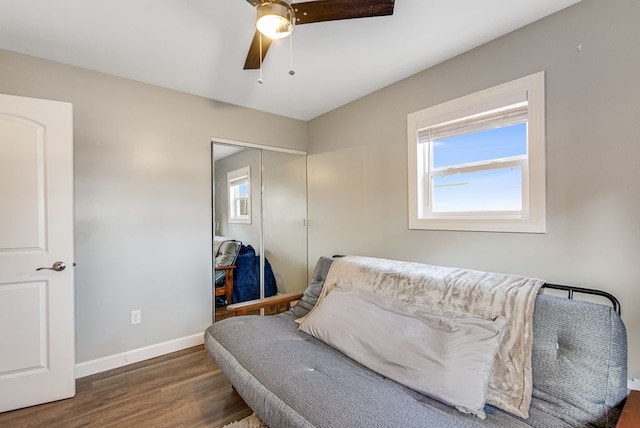 sitting room featuring ceiling fan, baseboards, and wood finished floors