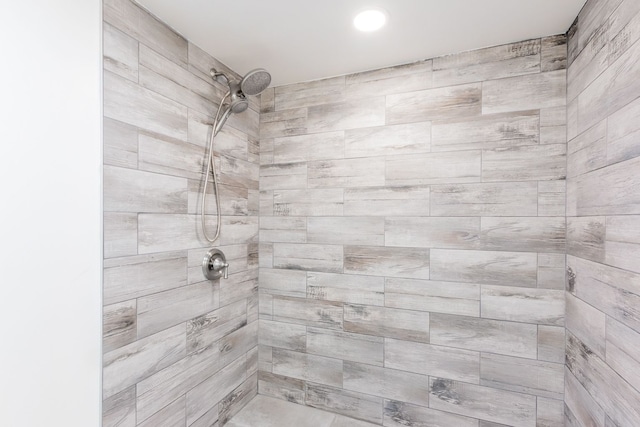 bathroom with tiled shower