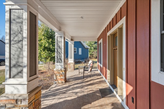 view of patio featuring a porch