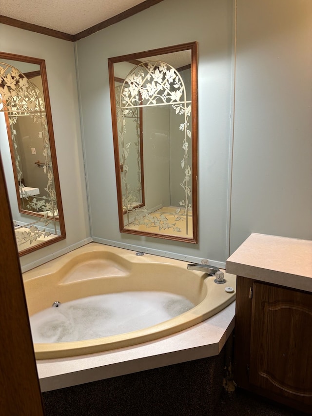 bathroom with ornamental molding and vanity