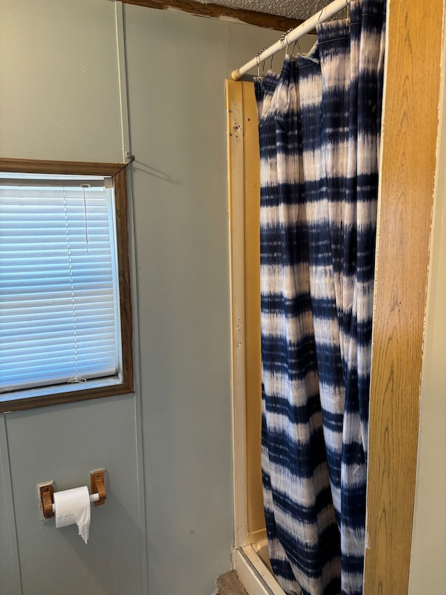 full bath with a shower with shower curtain