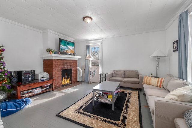 living area featuring a fireplace and ornamental molding