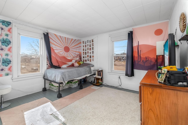 bedroom featuring baseboards