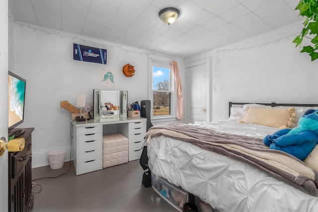 bedroom featuring wood finished floors