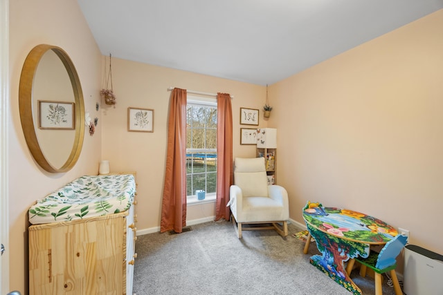 rec room featuring baseboards, a healthy amount of sunlight, and carpet flooring