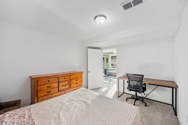 carpeted bedroom with visible vents