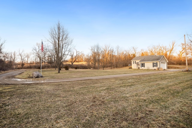 view of yard with a garage