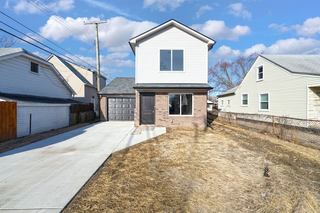 view of front of house featuring a garage, brick siding, driveway, and fence