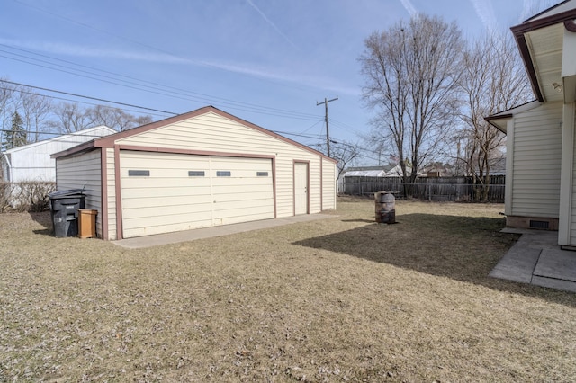 detached garage with fence