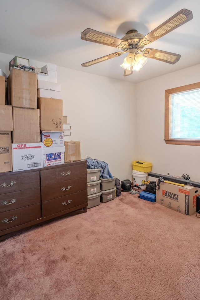 interior space with ceiling fan