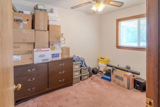 interior space featuring ceiling fan