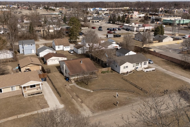 birds eye view of property with a residential view