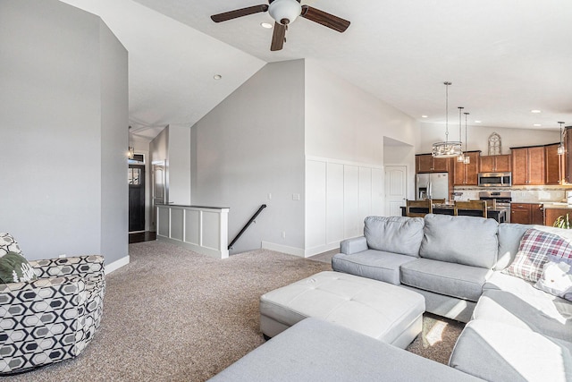 living room featuring high vaulted ceiling, recessed lighting, carpet floors, and ceiling fan