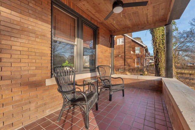 view of patio featuring ceiling fan