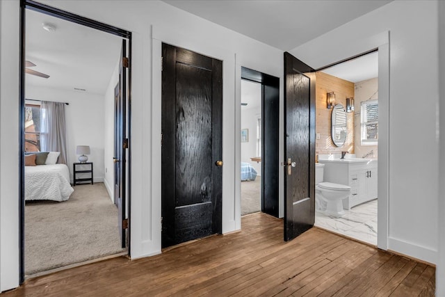 bedroom with hardwood / wood-style flooring