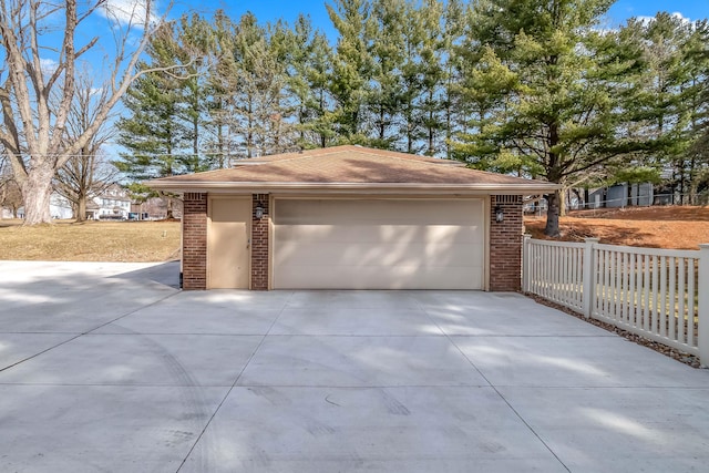 detached garage with fence