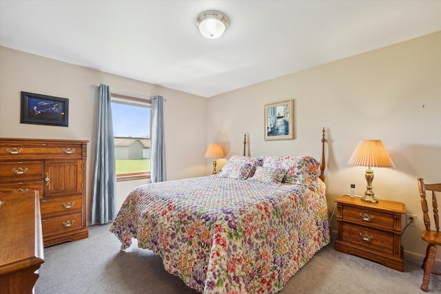 bedroom with light colored carpet