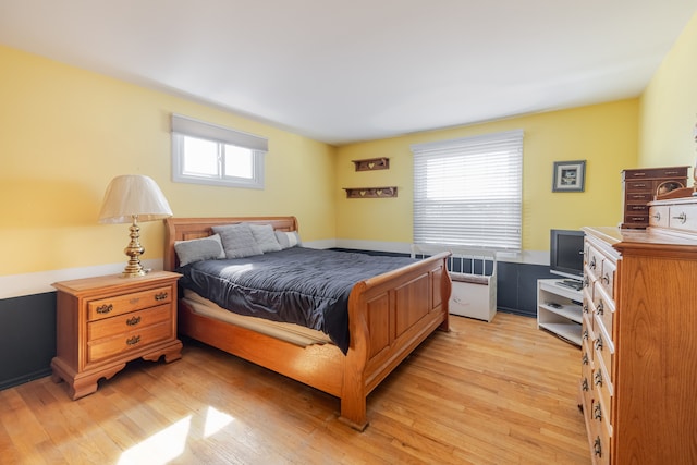 bedroom with light wood-style floors