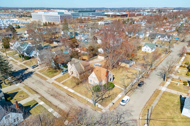 birds eye view of property with a residential view