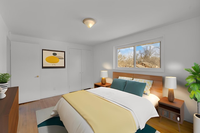 bedroom featuring a closet and wood finished floors