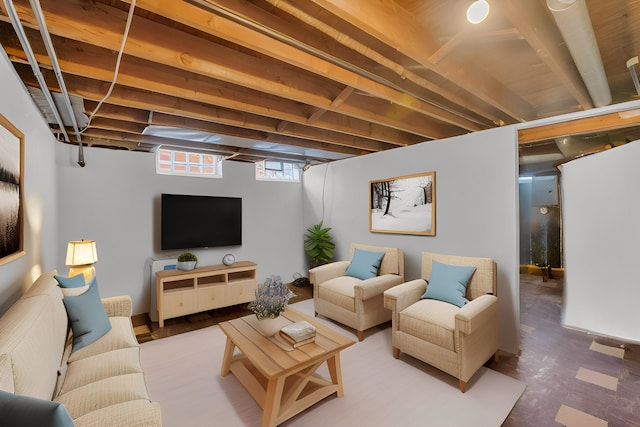 living room with concrete flooring