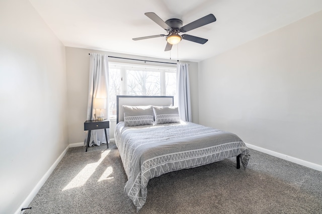 bedroom featuring carpet flooring, baseboards, and ceiling fan