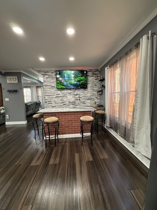 bar with recessed lighting, baseboards, dark wood-style floors, and crown molding