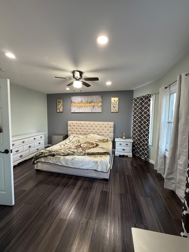 bedroom with recessed lighting, baseboards, dark wood-type flooring, and ceiling fan