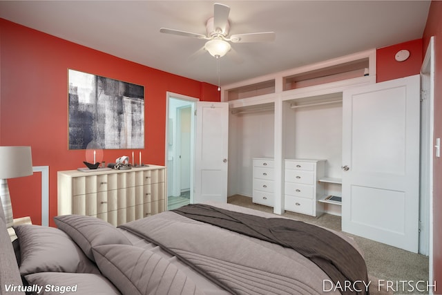 bedroom featuring carpet flooring and a ceiling fan