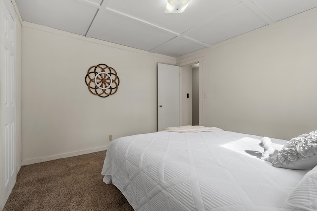 carpeted bedroom with baseboards