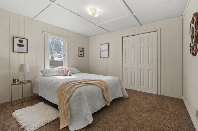 carpeted bedroom with a closet