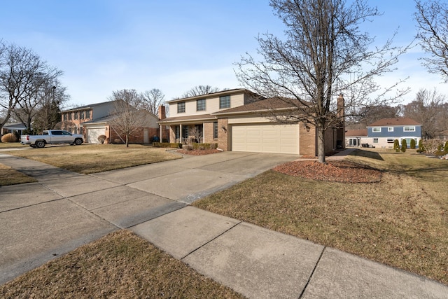 traditional home featuring a front lawn, concrete driveway, a garage, brick siding, and a chimney