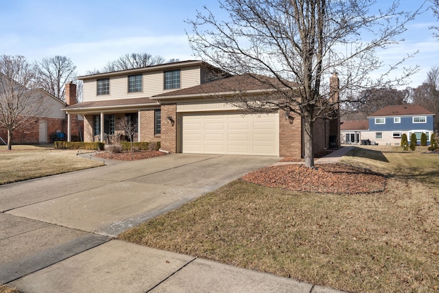 traditional home with a front lawn, a garage, brick siding, and driveway