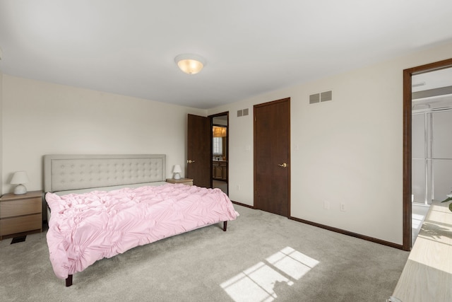 carpeted bedroom with baseboards and visible vents