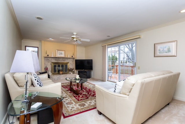 living room with light carpet, a fireplace, and ornamental molding