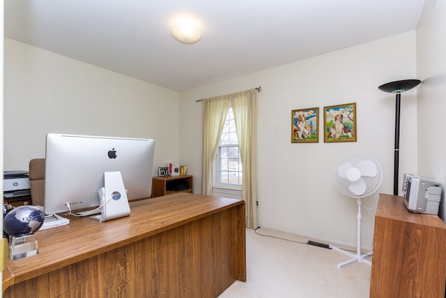 office area with light colored carpet and visible vents