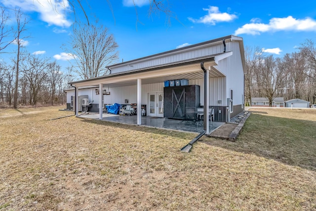 view of outbuilding featuring french doors