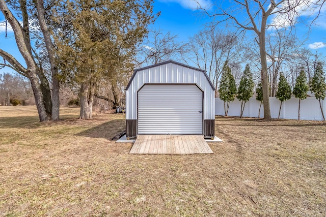 garage with fence