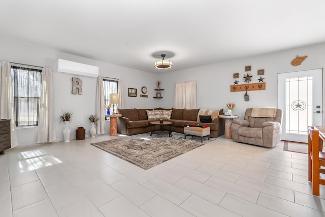 living room featuring an AC wall unit