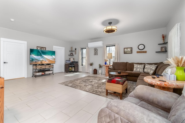 living area featuring a wall unit AC