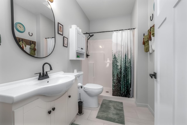 full bathroom featuring tile patterned floors, toilet, a stall shower, and vanity