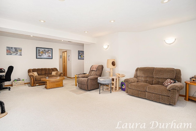 carpeted living room featuring recessed lighting and baseboards