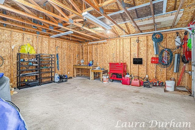 garage featuring a workshop area