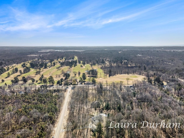 aerial view with a wooded view