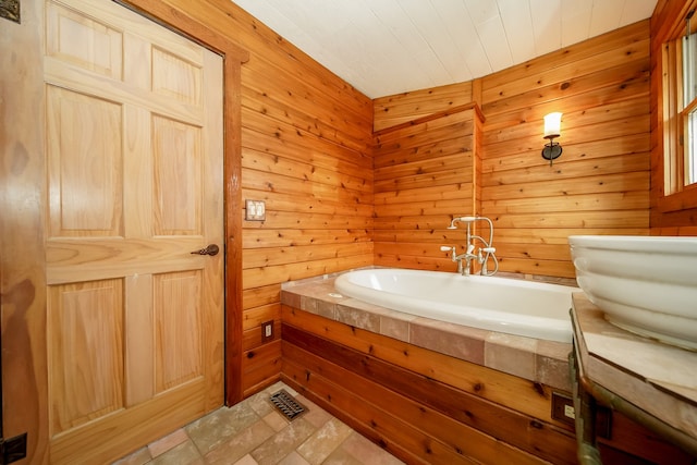 bathroom with wooden walls