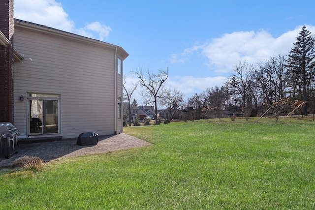 view of yard with a patio area