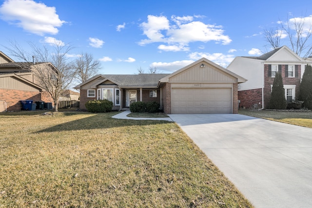 view of front facade with fence, driveway, a front lawn, a garage, and brick siding